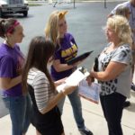 Ashland University students survey Shawshank fans during the Anniversary